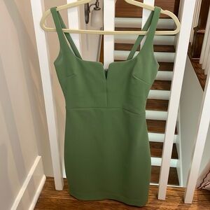 Green likely cocktail dress. Super cute for spring and summer size 2. Worn once